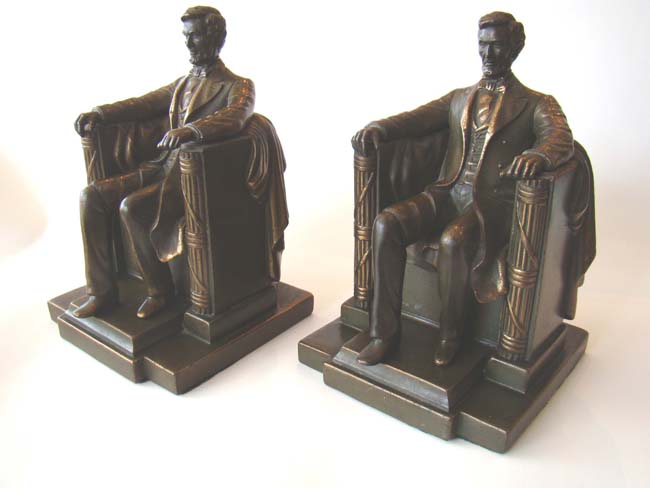 A pair of "Lincoln in the chair" bookends made by Jennings Brothers circa 1930